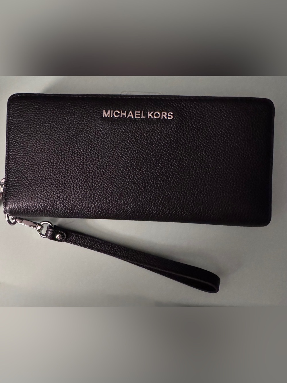 Michael Kors Black Pebbled Leather Wristlet with Silver Logo